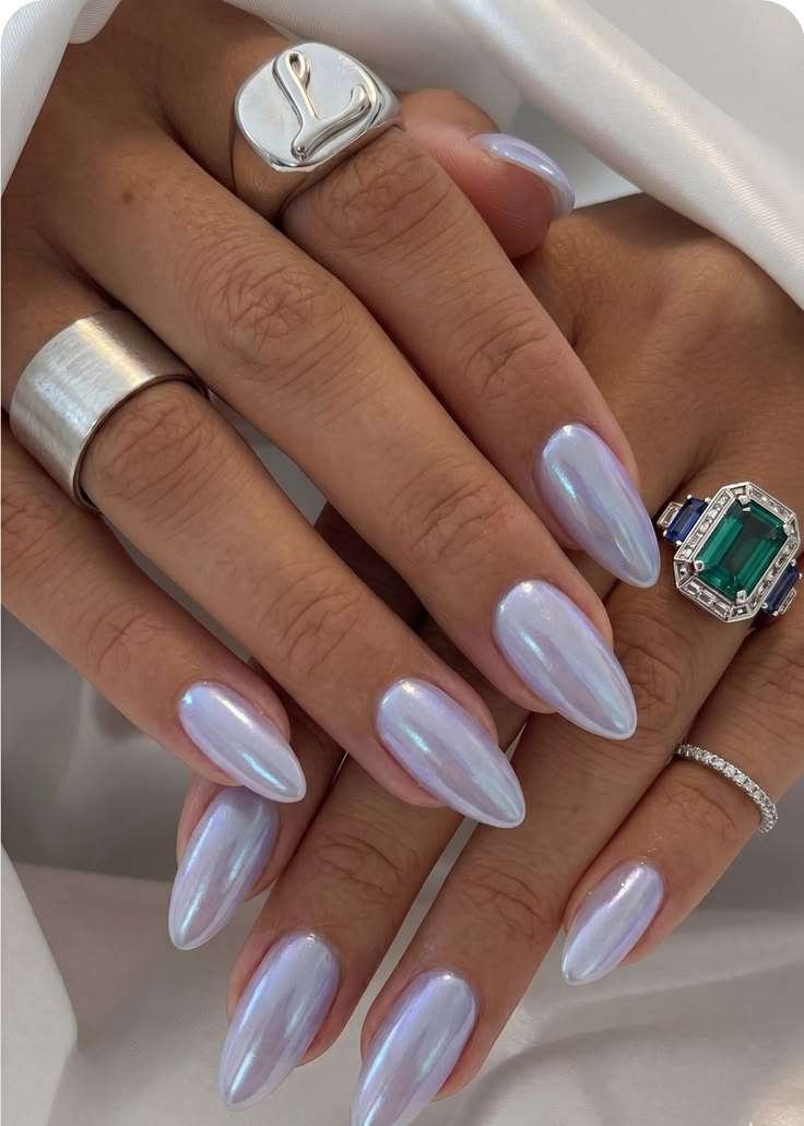 Cat eye nail art with spring-inspired fruit and funky nails. 3D design with leopard elements for an elegant natural look.