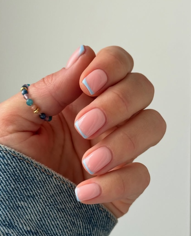 Short summer nails ideas 2026 with engagement nails ideas short. Subtle nails in almond shape with purple accents.