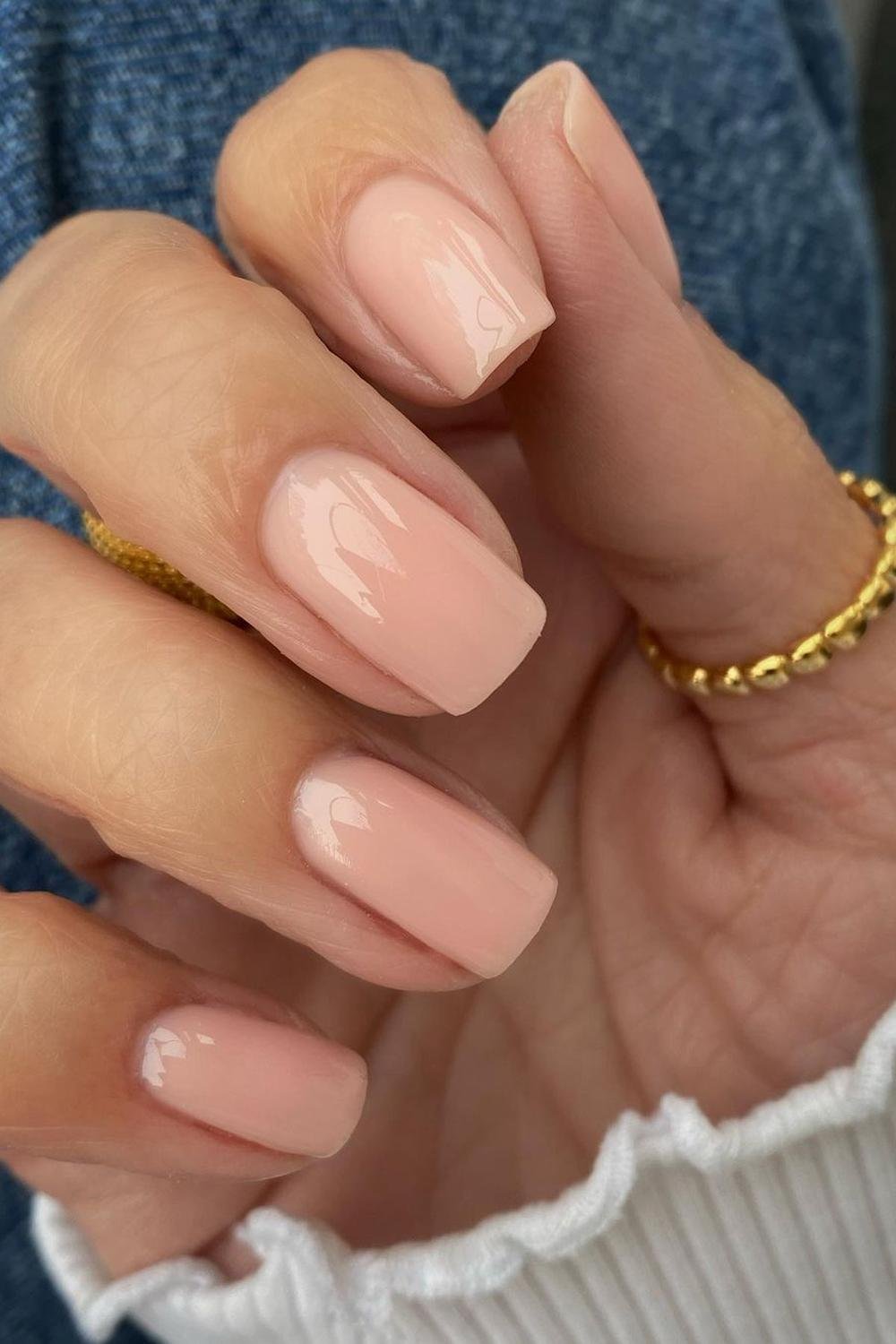 Nude chrome nails almond in winter style with natural chrome and milky brown long nails.