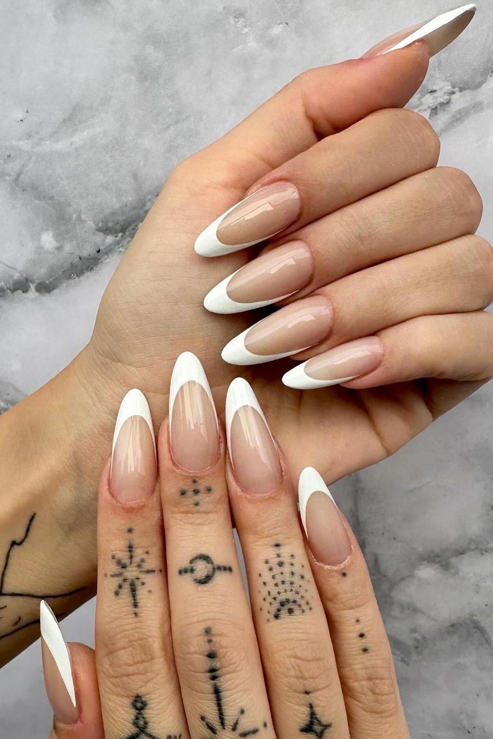 Nude sparkly nails with peachy tones on short gel for black women dark skin.