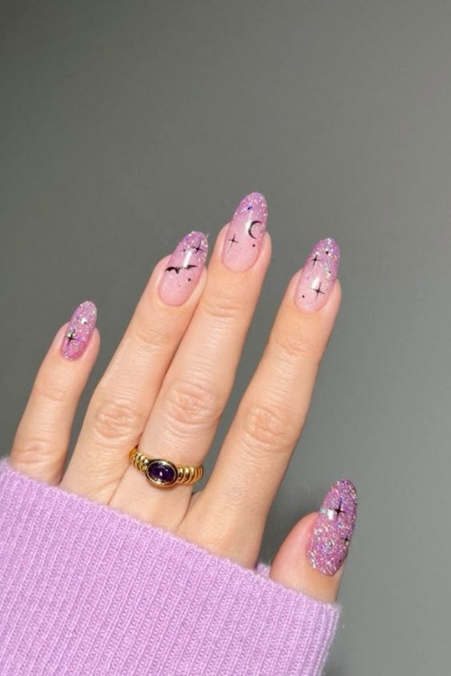 Hot pink halloween nails with translucent pink nails, creating a vibrant neon glow.