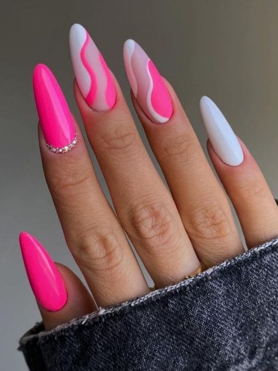 Pink cat eye nails with pink cheetah nails, showcasing pink nail designs and nail inspo almond with a bow accent.