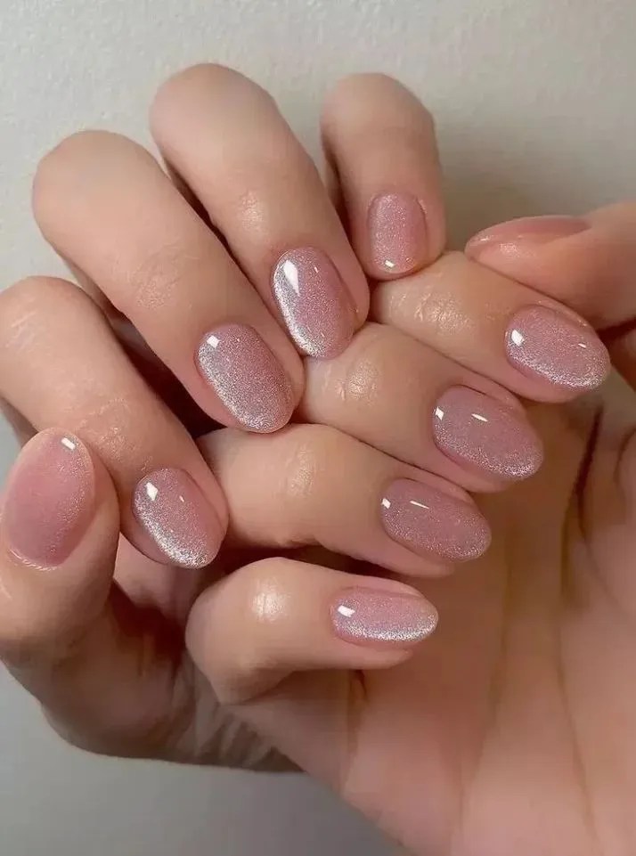 Pink and white nails with pink winter nails, inspired by hailey bieber nails, featuring pink french manicure and white ombre.