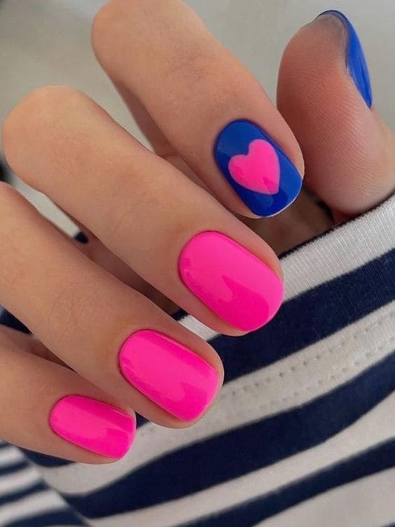 Black and pink nails with pink fall nails, glazed baby pastel finish.