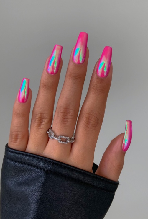 Pink glitter nails with pink jelly nails, featuring pinkmas nails and a cat eye cheetah pattern.