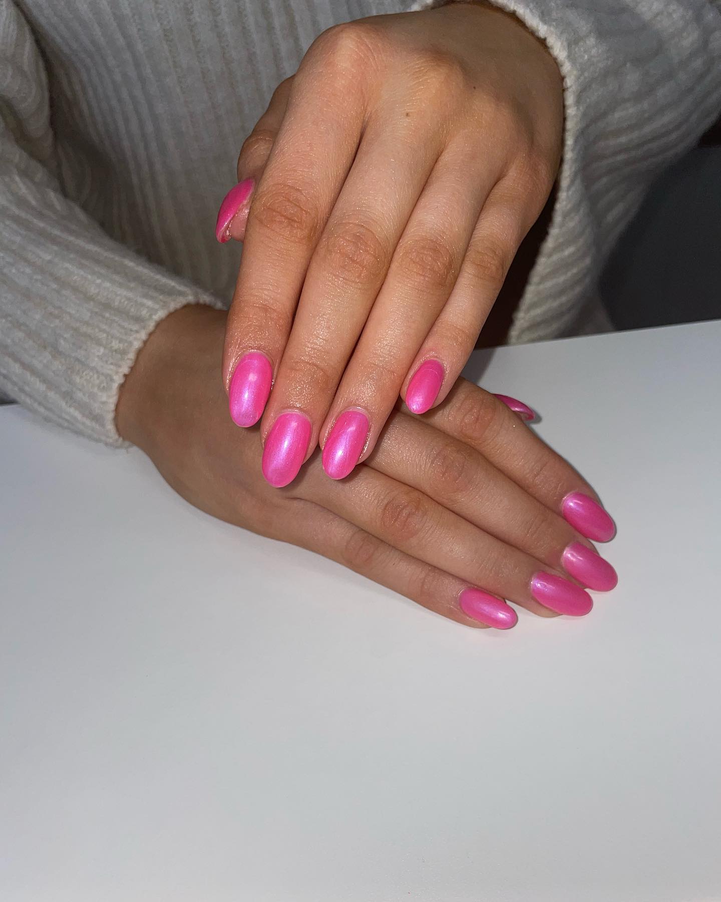 Green and pink nails with dusty pink nails, featuring simple christmas nails with almond shape and hot chrome.
