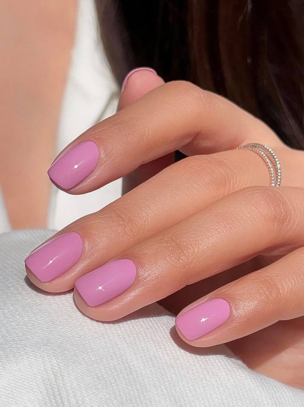 Pink toe nails with pink and silver nails, featuring fall nails with black and fall tones.