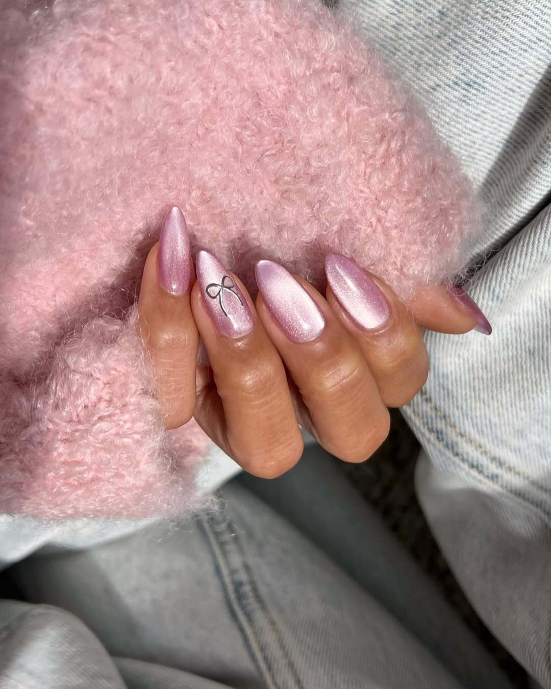 Pink birthday nails with pink sparkle nails, featuring milky nude nails with gold accents for prom.
