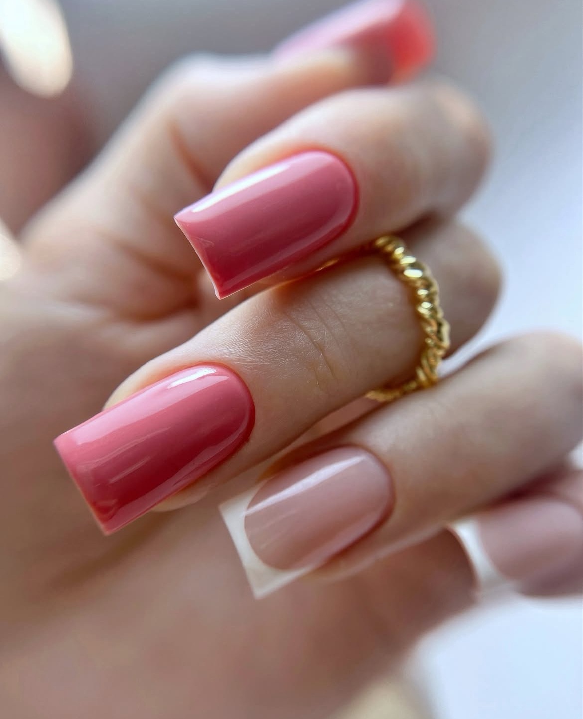 Pink flower nails with plain pink nails, featuring fun summer nails in blue and jelly style.