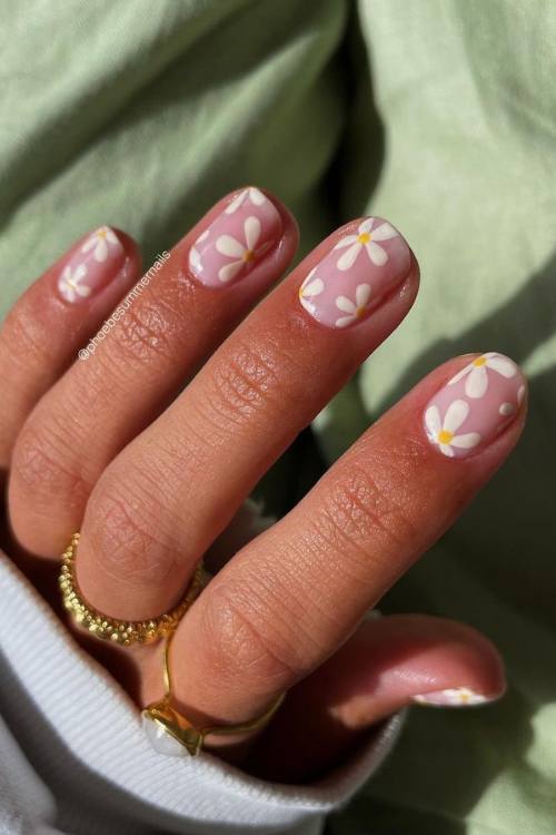 Pink girly nails with pink nail art, featuring pink cateye nail design and aura valentine style.
