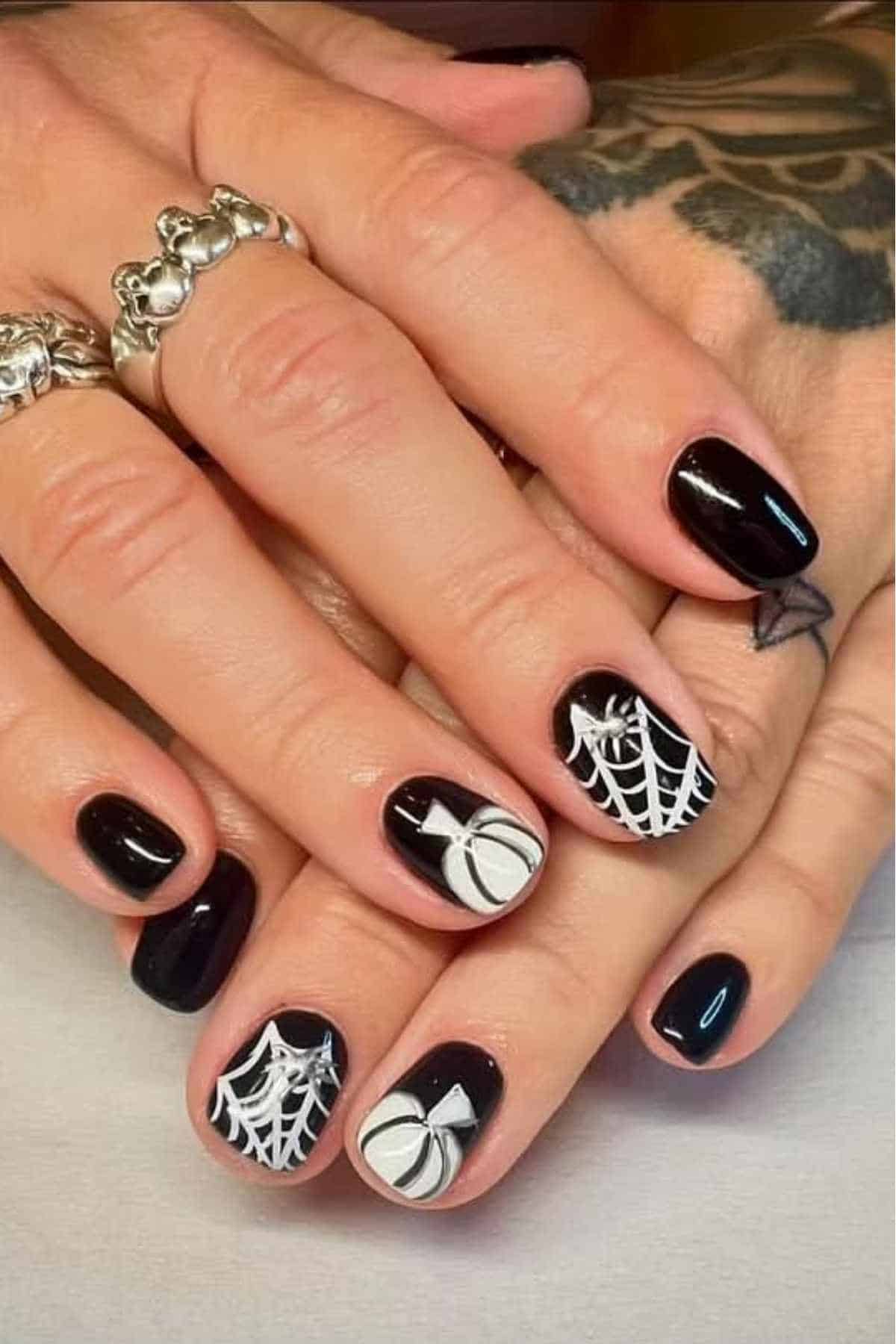 Halloween gel nails short with purple and black nails designs and classy style