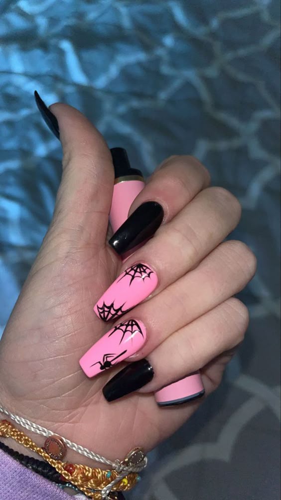 Subtle halloween nails short with purple halloween nail designs and pink theme