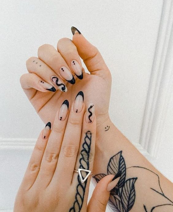 Autumn nails with lime green and black nails
