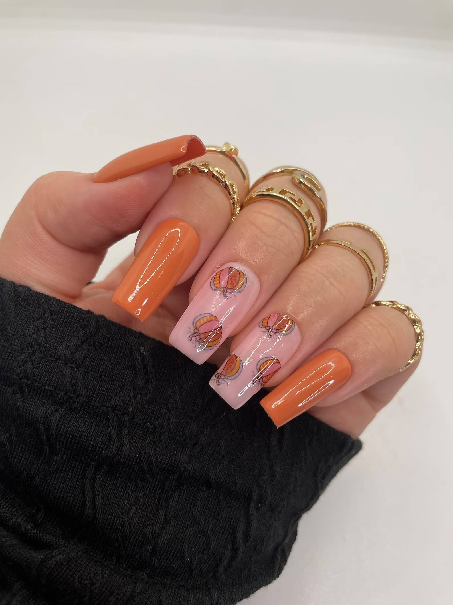 Halloween coffin nail ideas with pumpkins