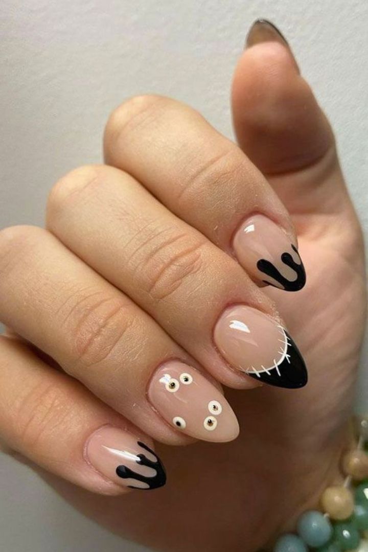 Edgy halloween nails with drip design