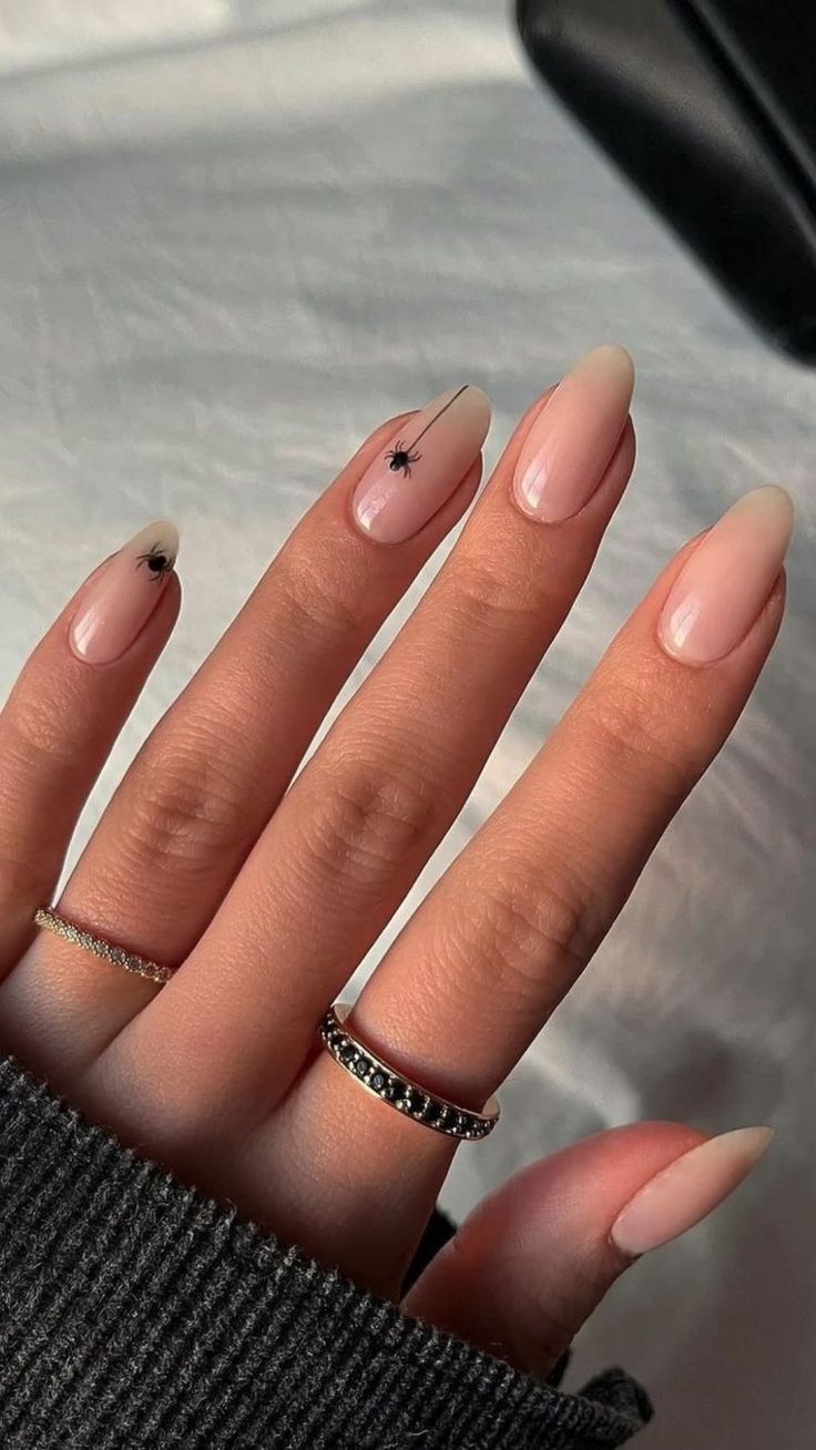 Black and orange nail designs with gradient effect