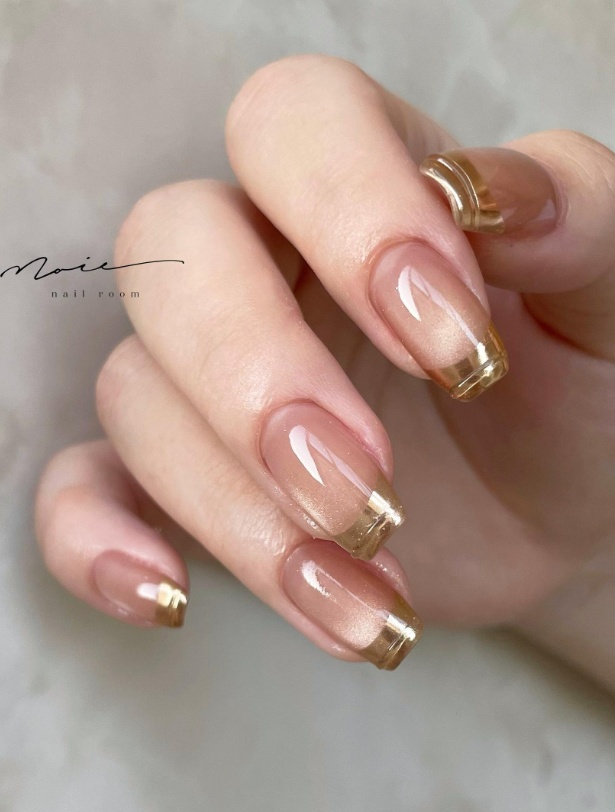 Bridal nails wedding elegant and unique, featuring classy bridesmaid nails in nude tones. Ideal nail inspo for wedding guest.
