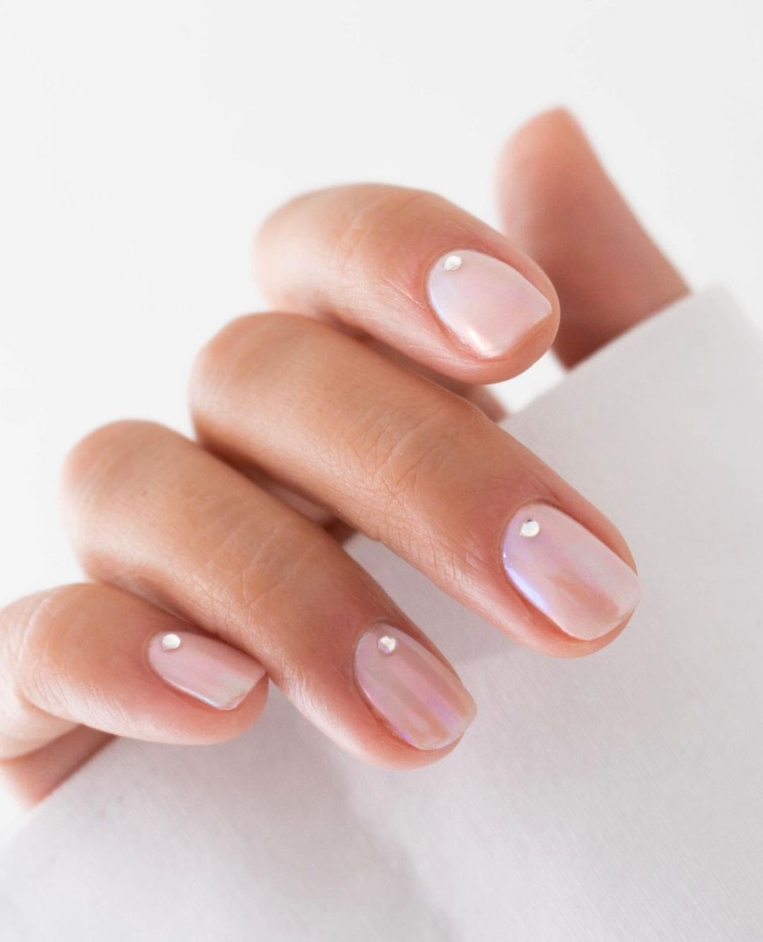 White wedding nails with simple wedding nails design, perfect for wedding manicure and bridal indian style french tip.