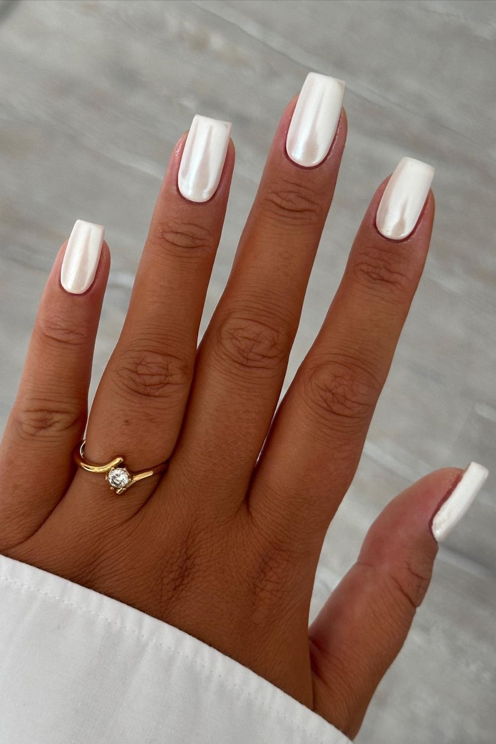 White cat eye nails with blue white nails, witchy nails, red French tip nails, short acrylic, with gold.