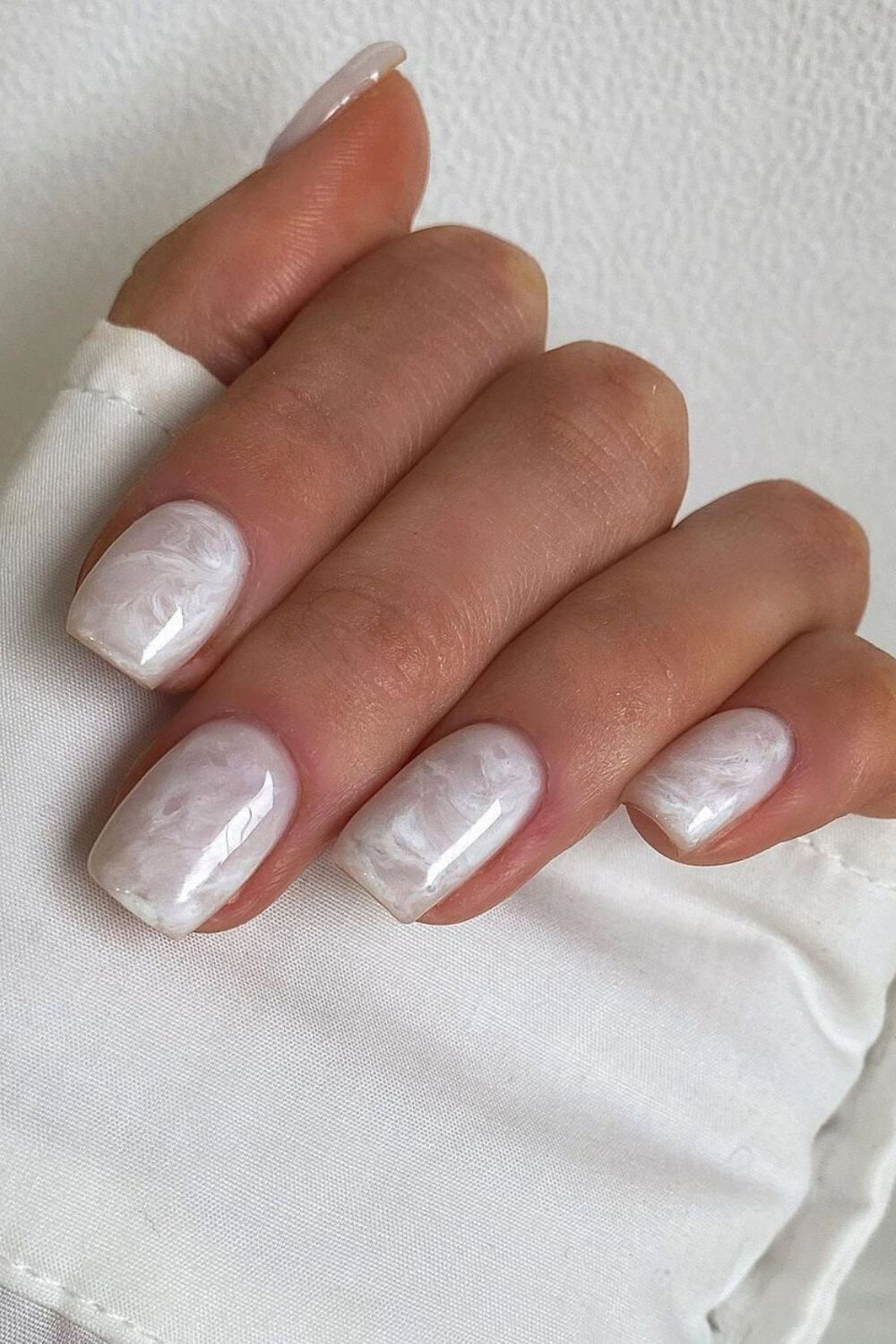 Milky white nails acrylic with white nails with rhinestones, almond French tip nails, pink and red nails, tip acrylic, bow.
