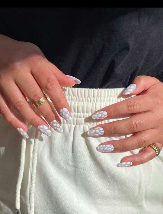 White glitter nails with long nails, pearl chrome nails, almond nails with design, sparkle.