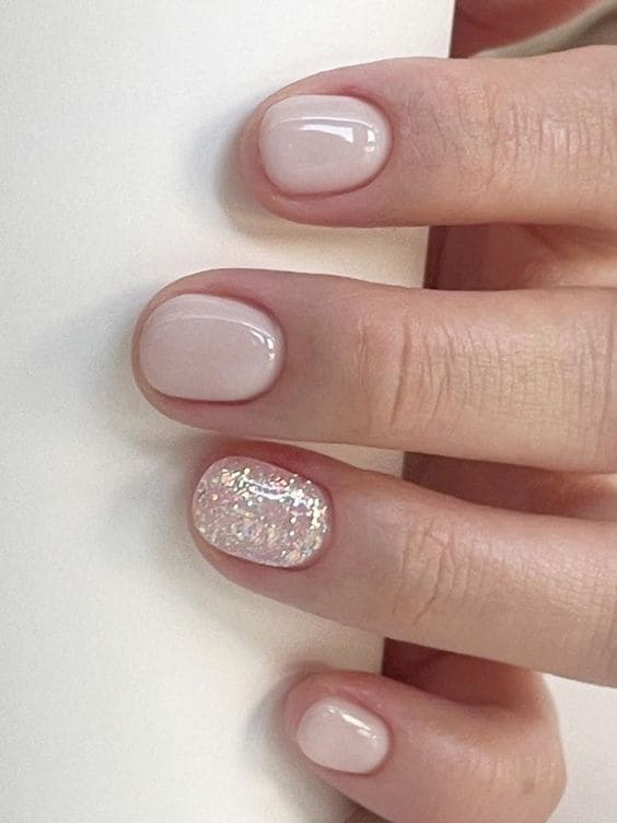 Black and white polka dot nails with white nails with gold, pink nails with designs, almond, marble.