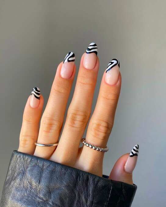 White stiletto nails with classy nails, pink and white French tip, milky with, milky cat eye.