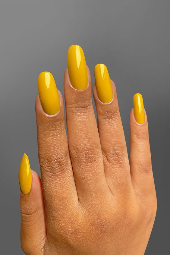 Yellow toe nails, yellow prom nails, short butter yellow nails, fun summer nails, neon orange nails, spring, prom, easter.
