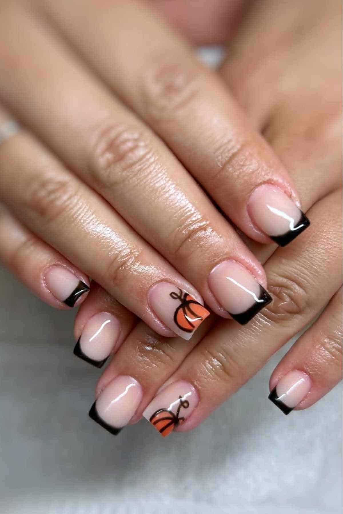 French nails with pumpkin accents