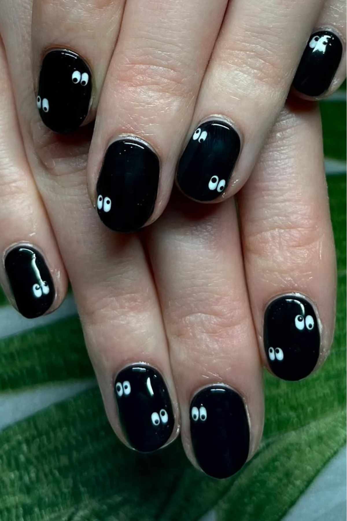 Black nails with eye designs