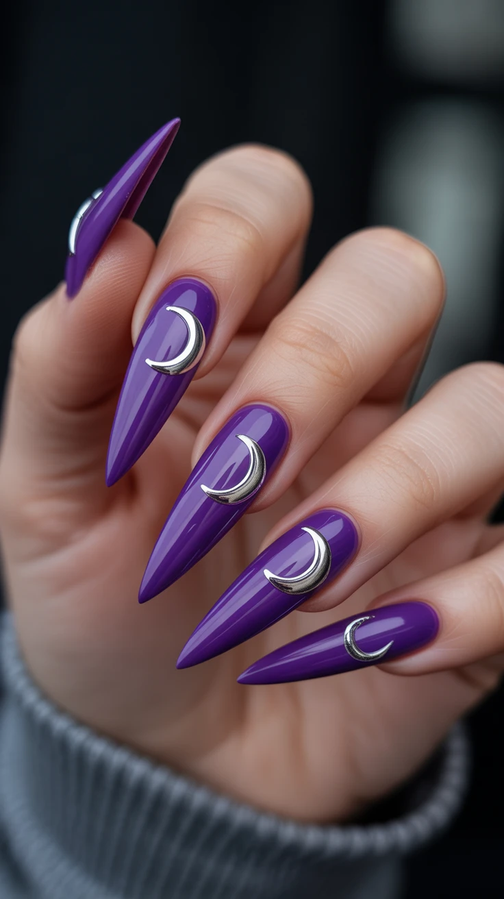 Purple stiletto nails with silver crescent moons