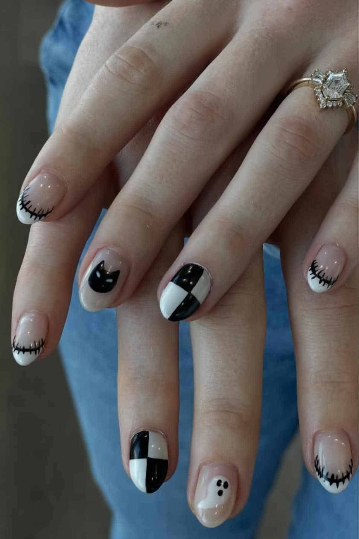 Nude nails with black and white patchwork designs