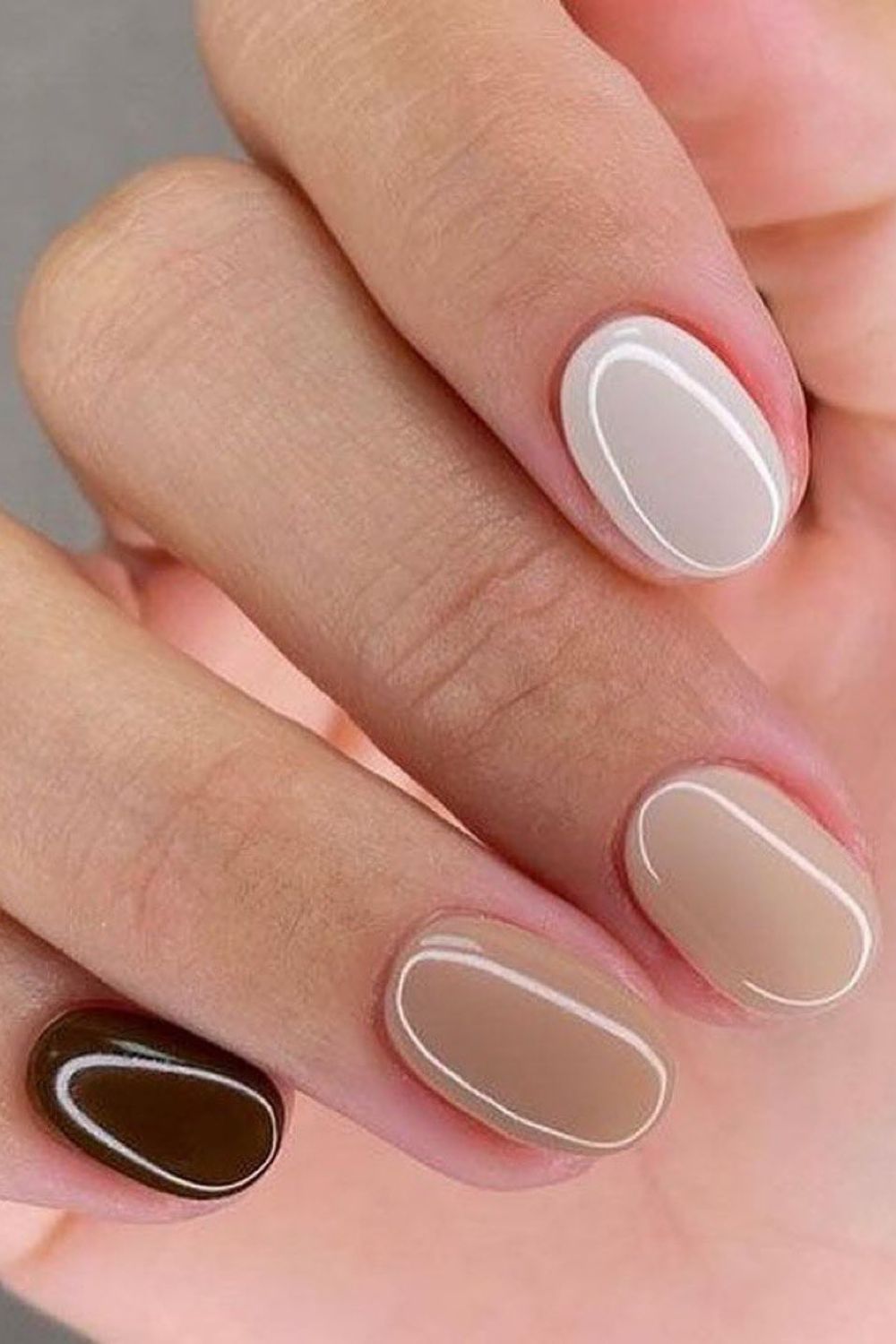Neutral tone nails with glossy finish