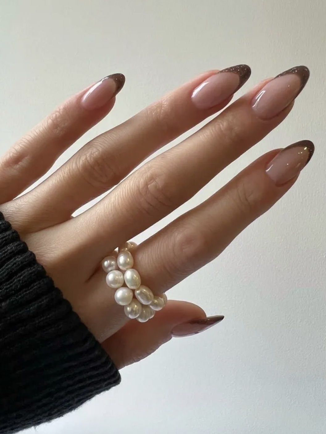 Chocolate French manicure with nude base