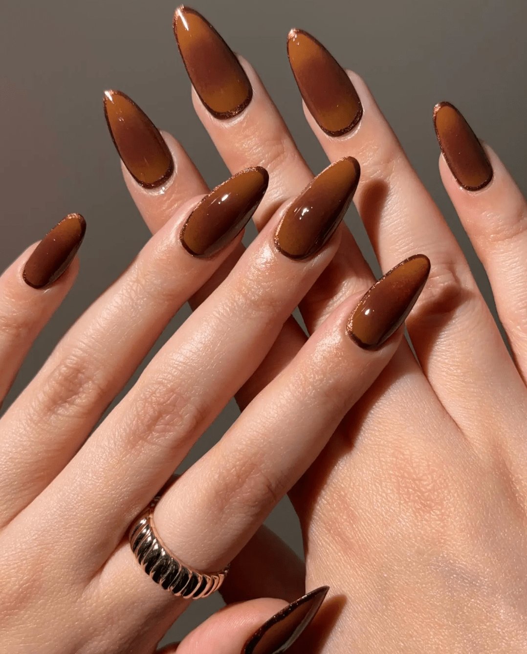Rich chocolate nails with glossy finish