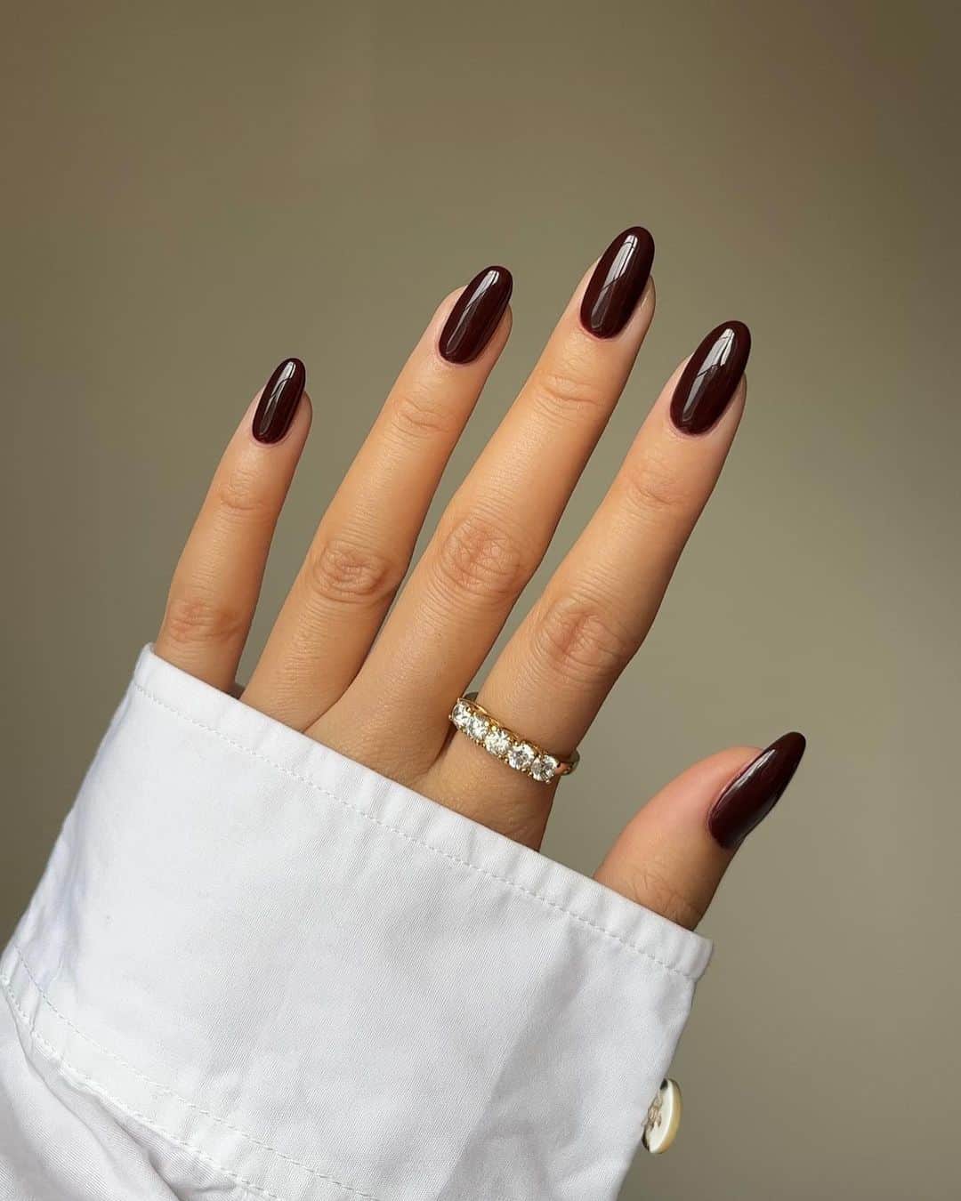 Deep burgundy nails with glossy finish