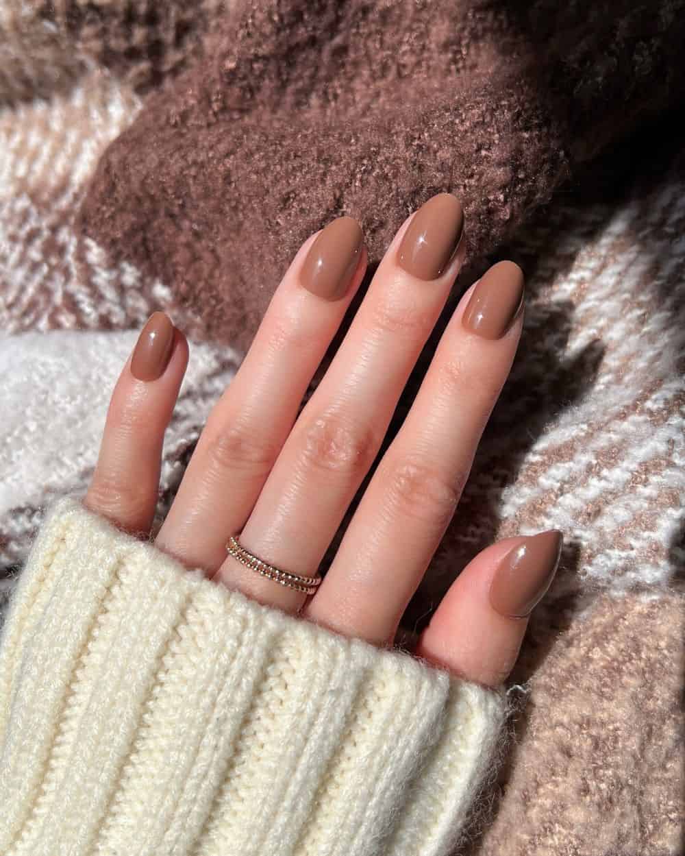 Taupe nails with a glossy finish