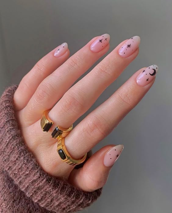 Nude nails with celestial tiny stars.