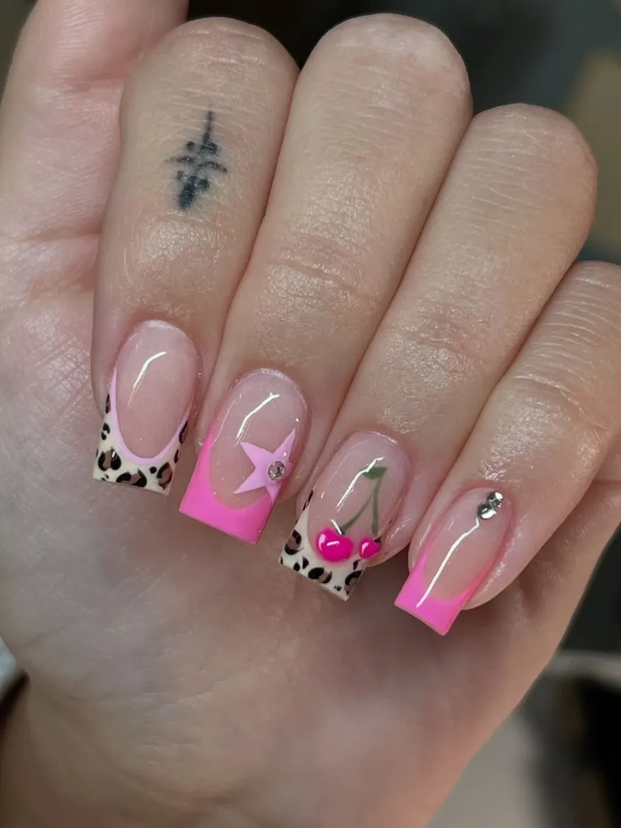 Square nails with pop art French tips.