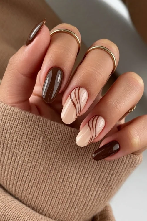 Almond nails with coffee and cream geometric design, stylish autumn nails