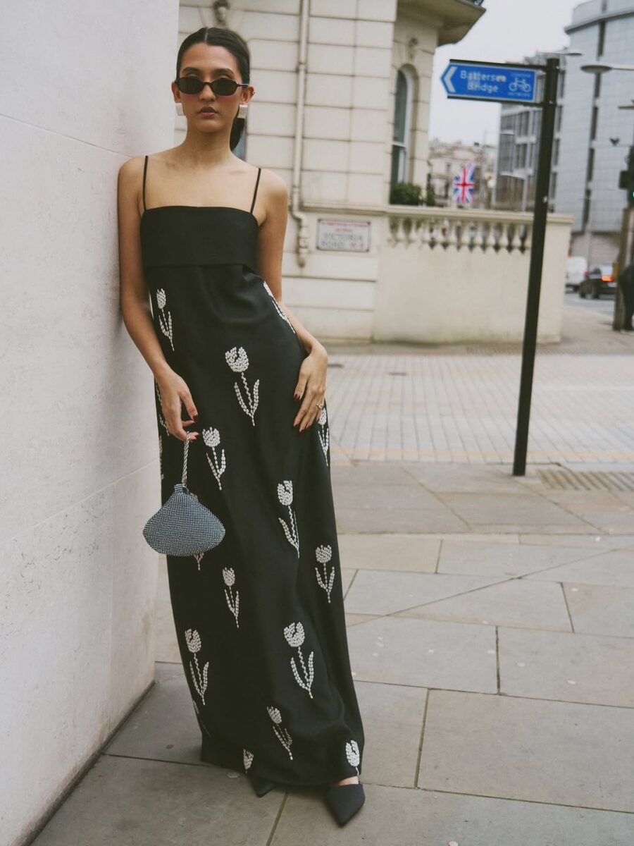 Flowy black maxi dress with floral details