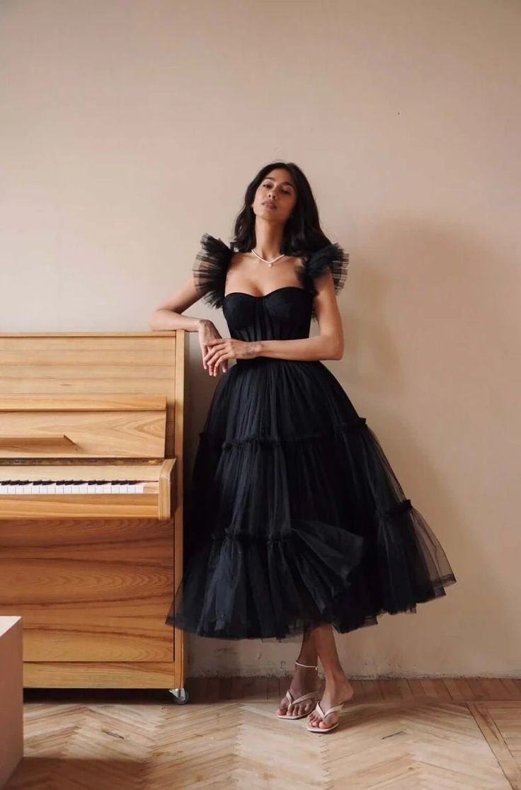Black tulle dress with tiered skirt for event
