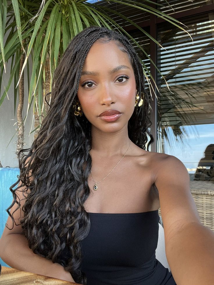 Long box braids with loose curls