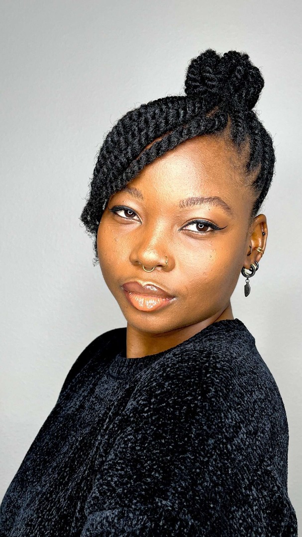 Twisted top knot with side-swept detail