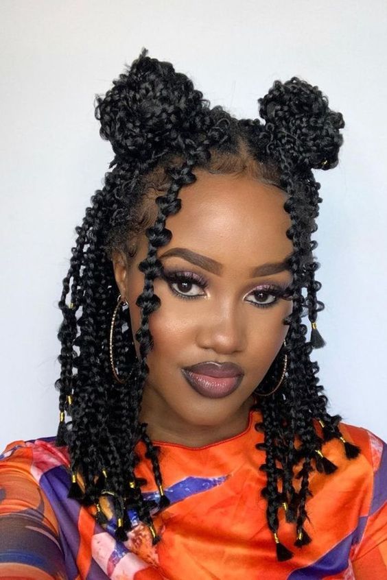 Space buns with box braids for Black women
