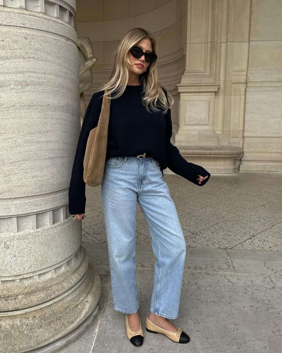 Navy sweater with light jeans