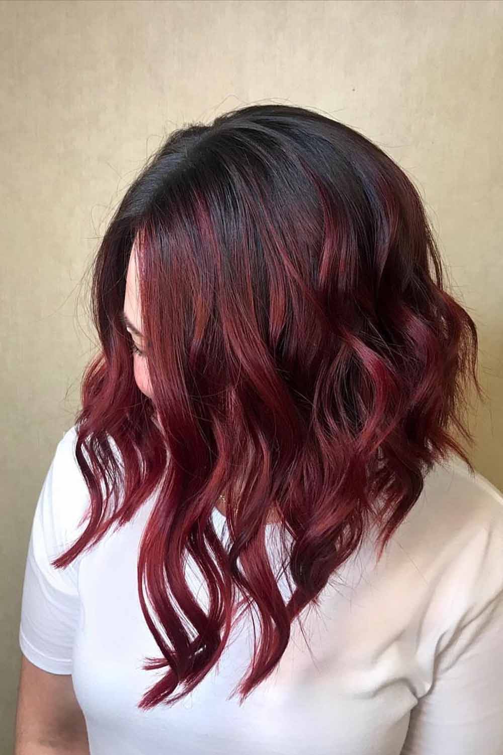 Rich burgundy wavy bob with volume