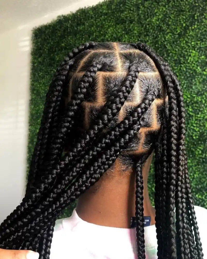 Classic box braids with defined parts and sleek finish