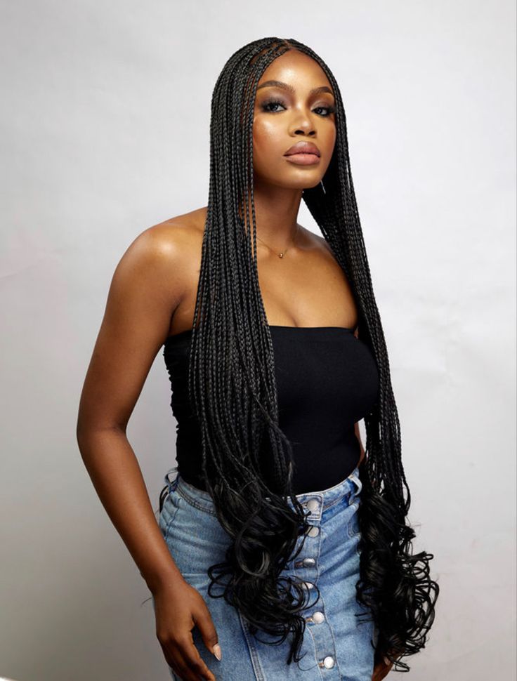 Extra long box braids with defined curls