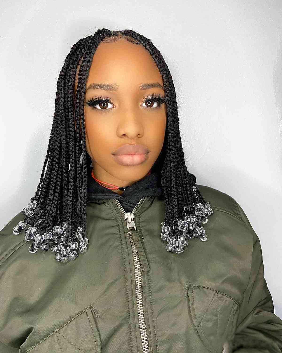 Short box braids with beaded ends